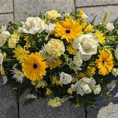 yellow &amp;white funeral spray